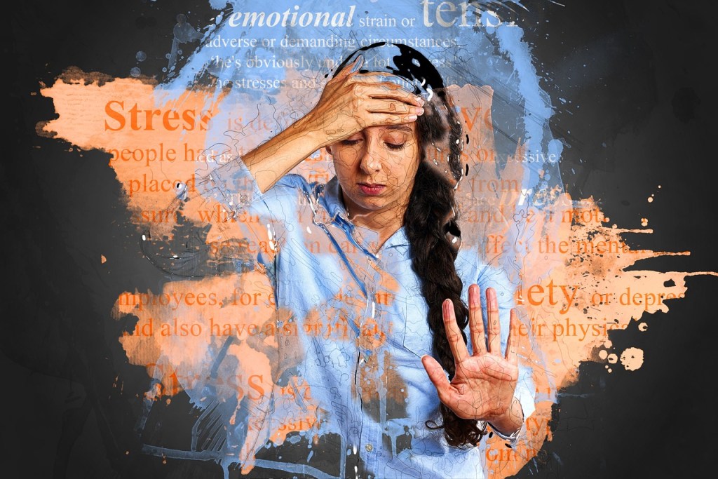 Woman surrounded by the words stress, anxiety emotional strain.